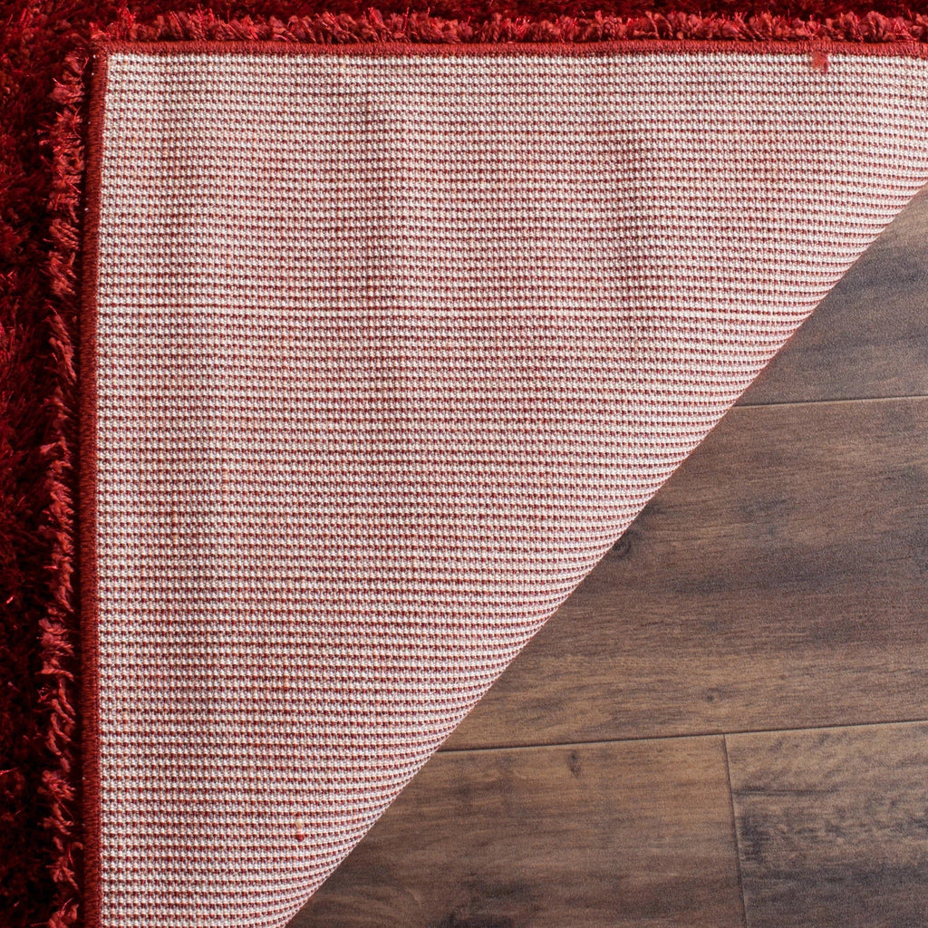 SAFAVIEH Charlotte Solid Plush Shag Area Rug, Red, 8' x 10'