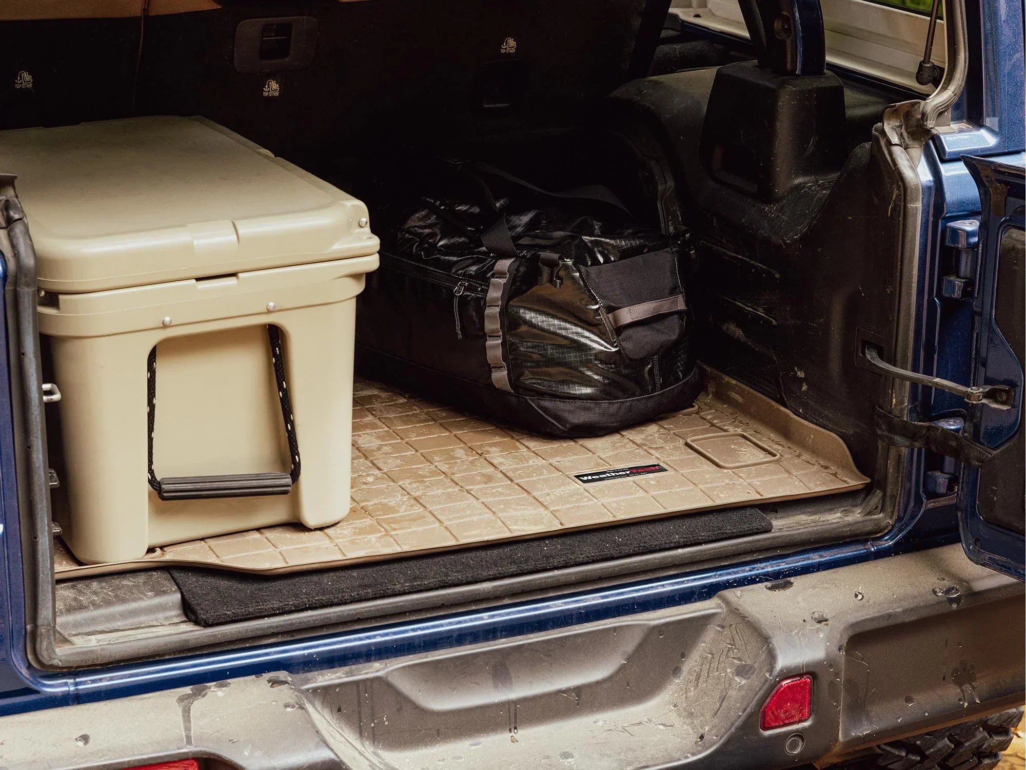 WeatherTech Cargo Trunk Liner with Bumper Protector compatible with 2007-2014 Jeep Wrangler 2-Door - Behind 1st Row Seating With Bumper Protector, Black